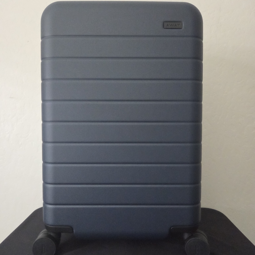Away Navy Blue Rolling Suitcase